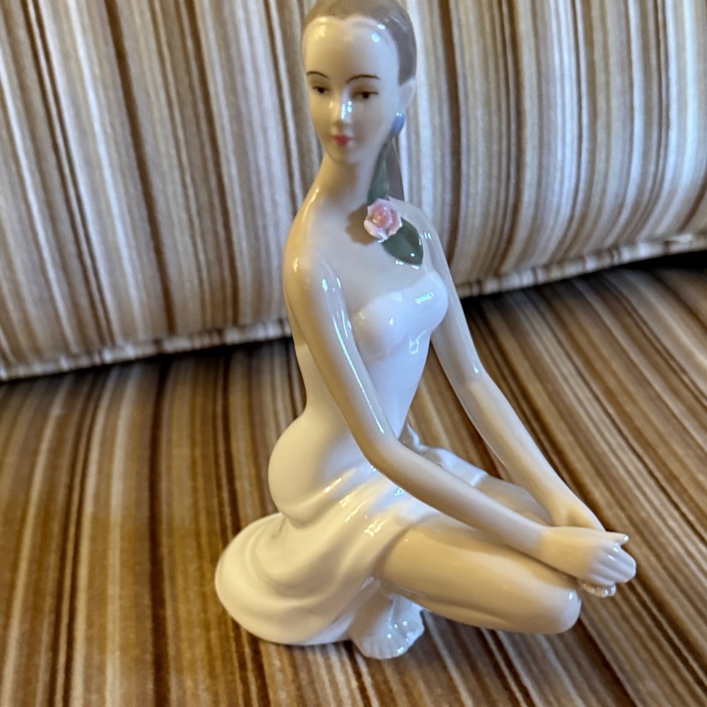 Elegant Porcelain Figurine with Rose Accent